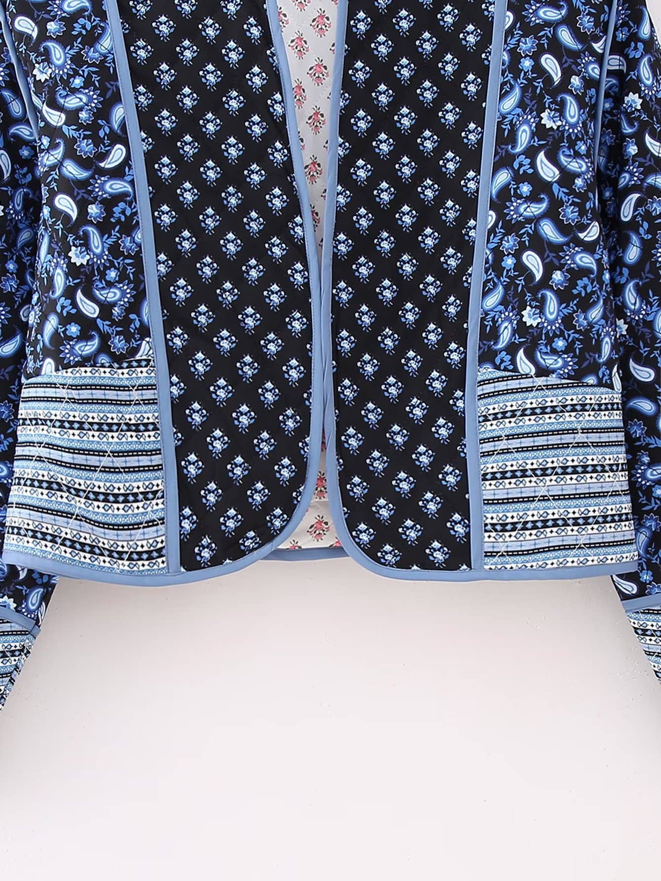 Rosa Clothing - Reversible floral Quilted cropped jacket In Pink & Blue