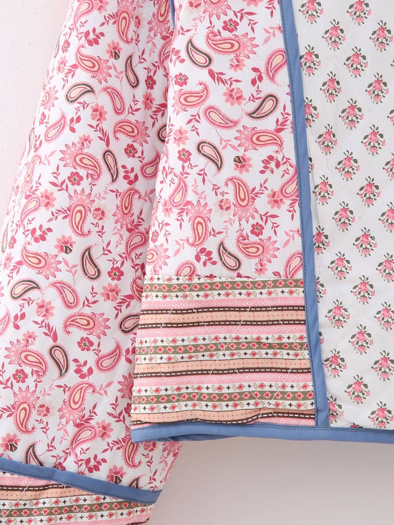 Rosa Clothing - Reversible floral Quilted cropped jacket In Pink & Blue