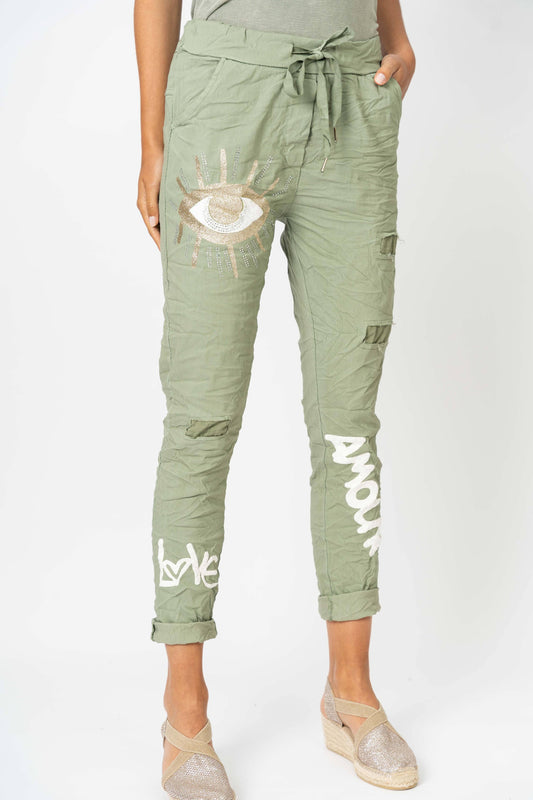 Look Mode Usa - Jegging pants with writing and Gold Eye
