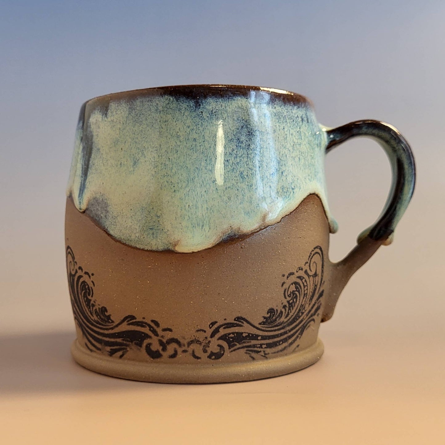 Divine Vessels Pottery - Octopus mug coastal design with wave glaze and sandy texture