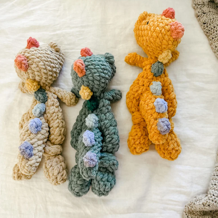 The Lumber Creek Co - Crochet Dinosaur Plushie Snuggler Lovey Stuffed Animal