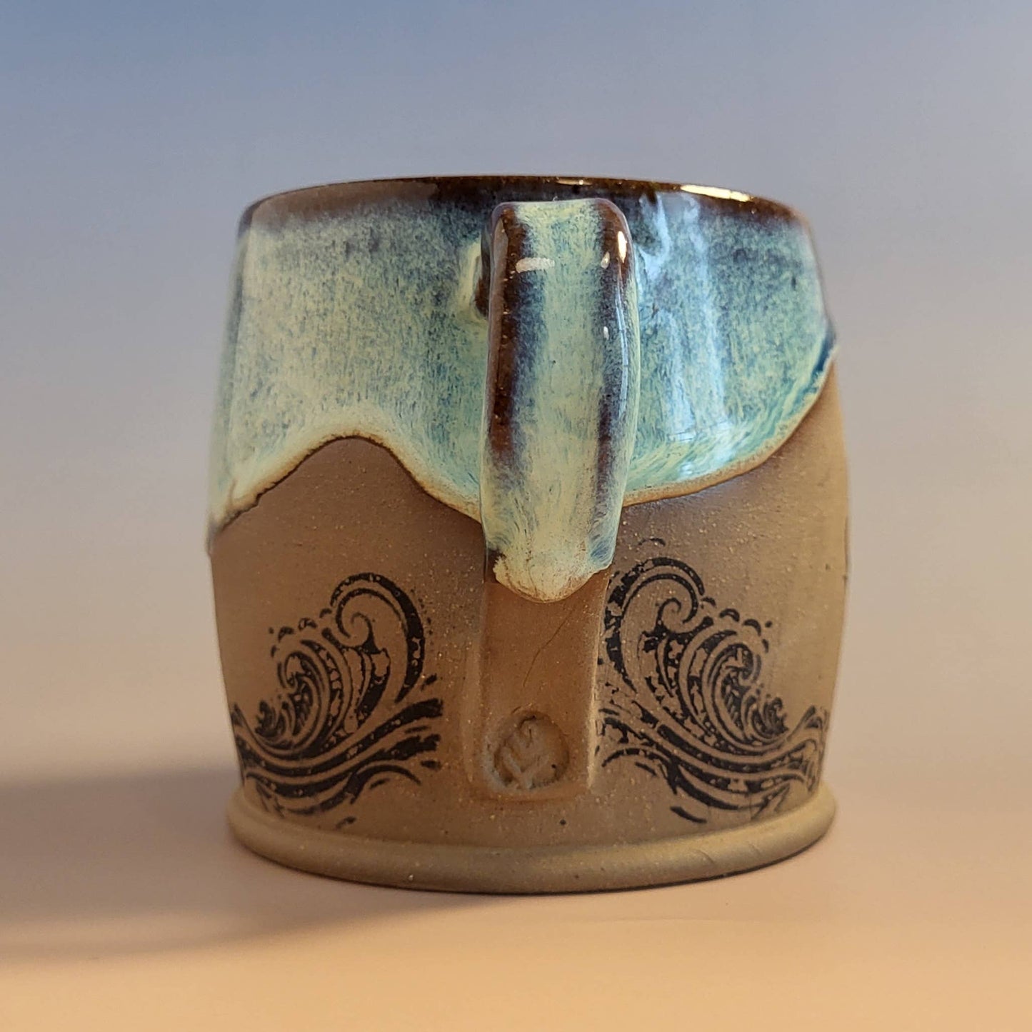 Divine Vessels Pottery - Octopus mug coastal design with wave glaze and sandy texture