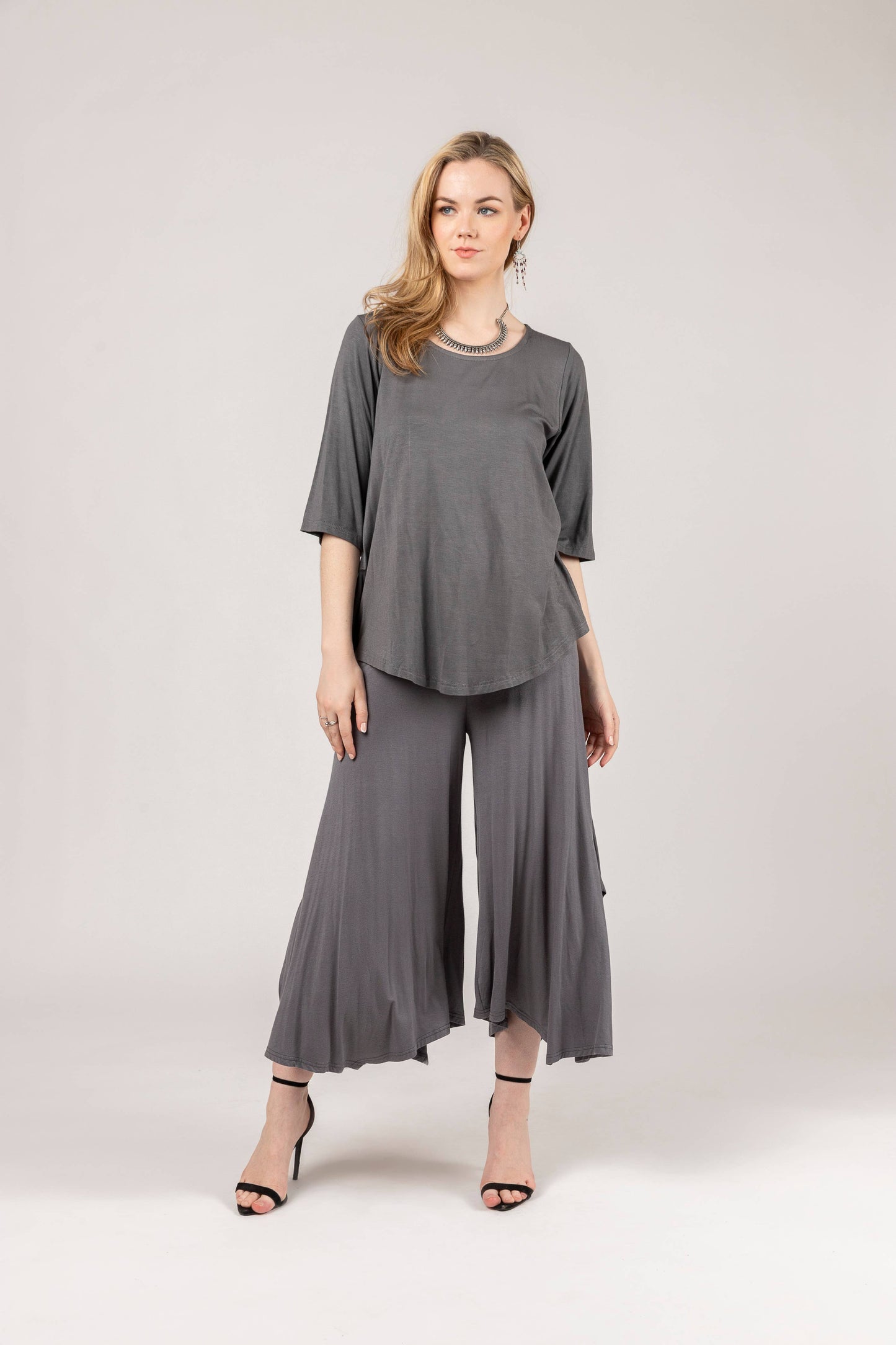 Windhorse Trading Inc - Wide-leg silhouette and Side-Slit.  NP61